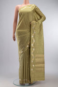 Green Banarasi Raw Silk Saree with Zari Butta on the body and Zari Border displayed on a mannequin