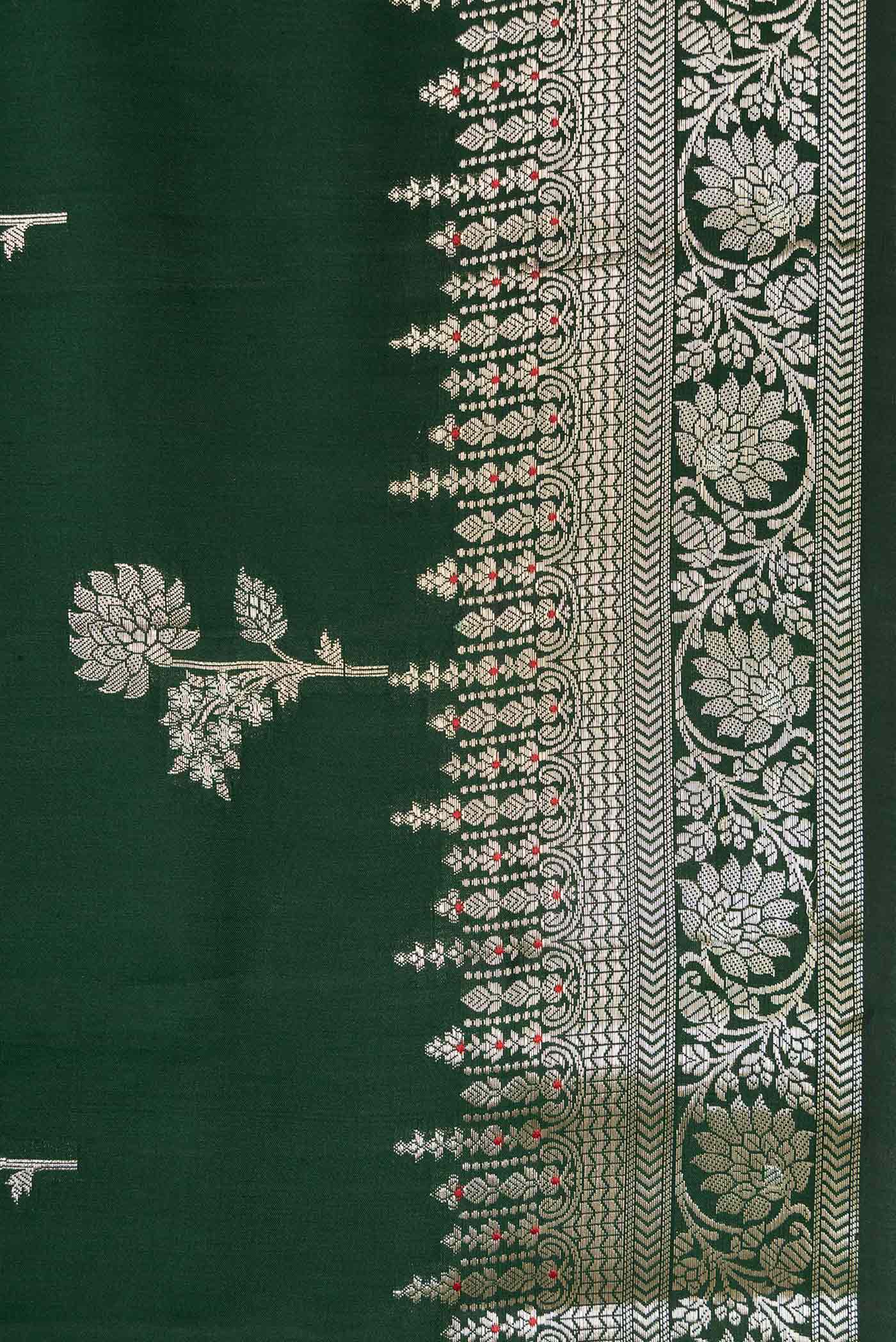 Border image of Bottle Green Dual Tone Tussar Silk Saree with Zari Butta on the body and Zari Border. 