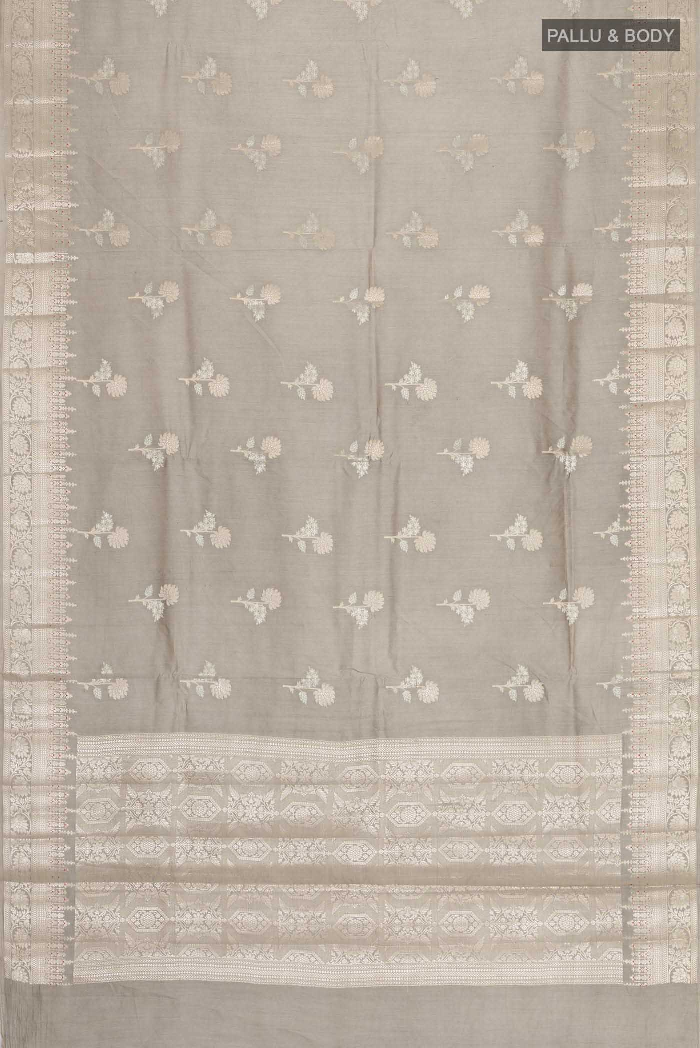 Flat view of Grey Banarasi Raw Silk Saree with Zari Butta on the body and Zari Border