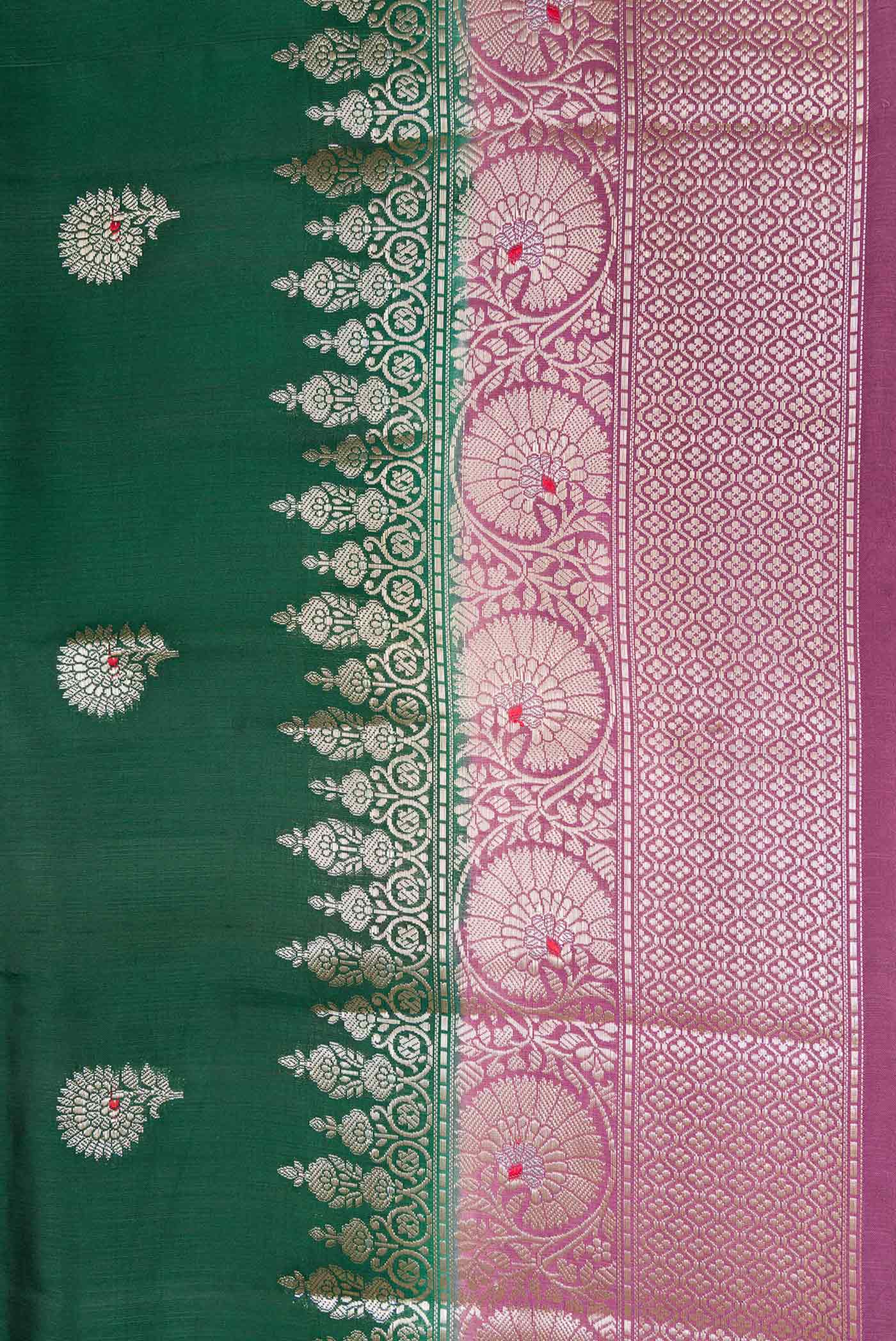Border image of Bottle Green Dual Tone Tussar Silk Saree with Zari Butta on the body and Zari Border. 