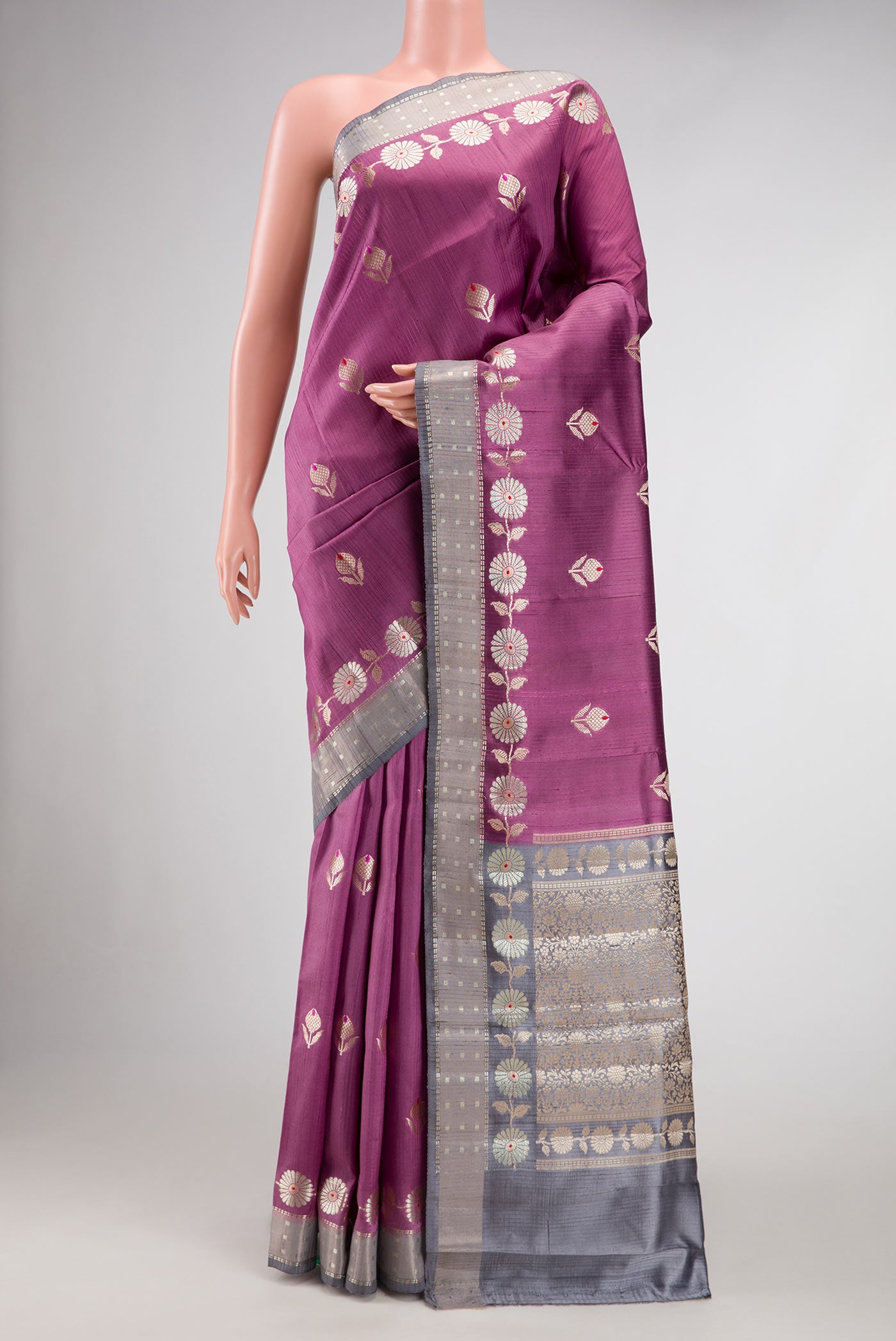 Purple Dual Tone Tussar Silk Saree with Zari Butta on the body and Zari Border.  displayed on a mannequin
