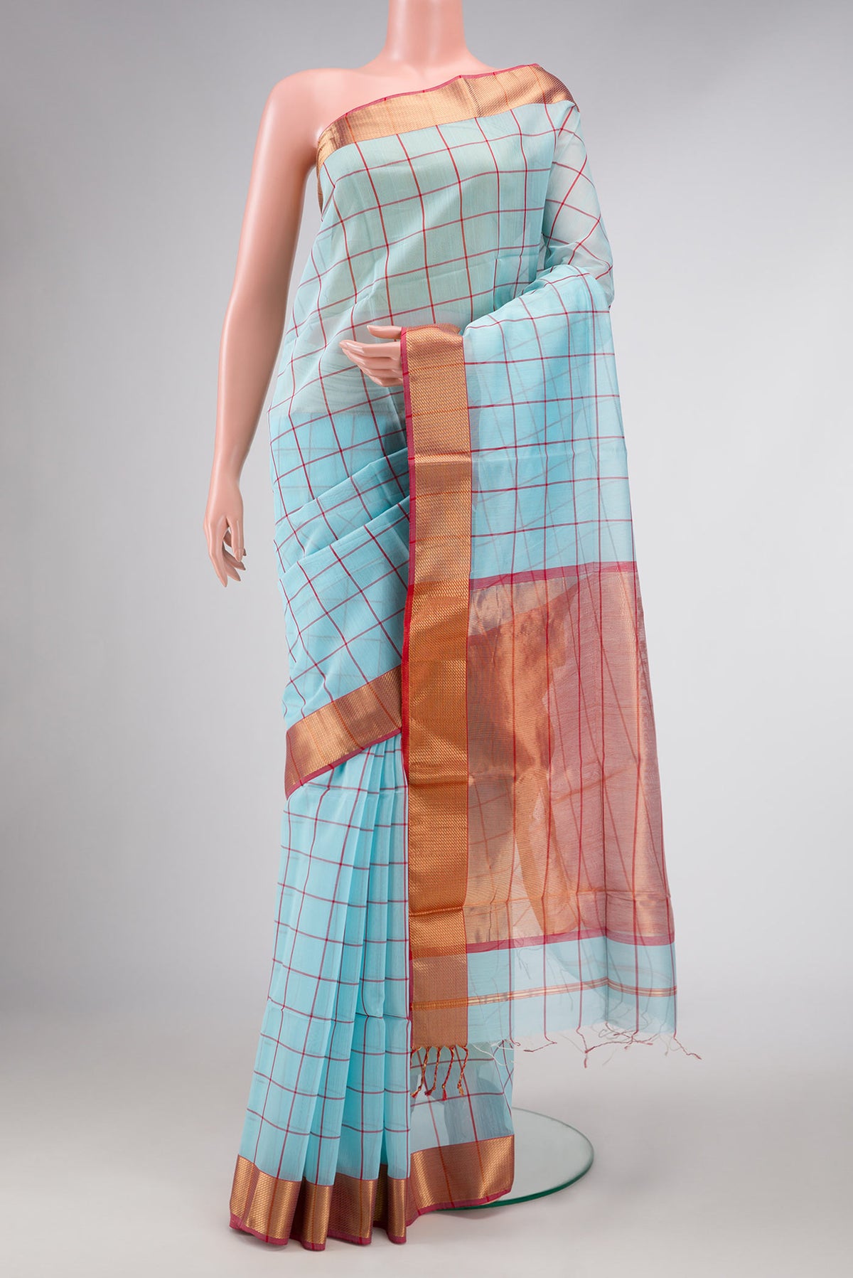 Sky Blue Dual Tone Maheshwari Silk Saree with Checked design on the body and Zari Border displayed on a mannequin
