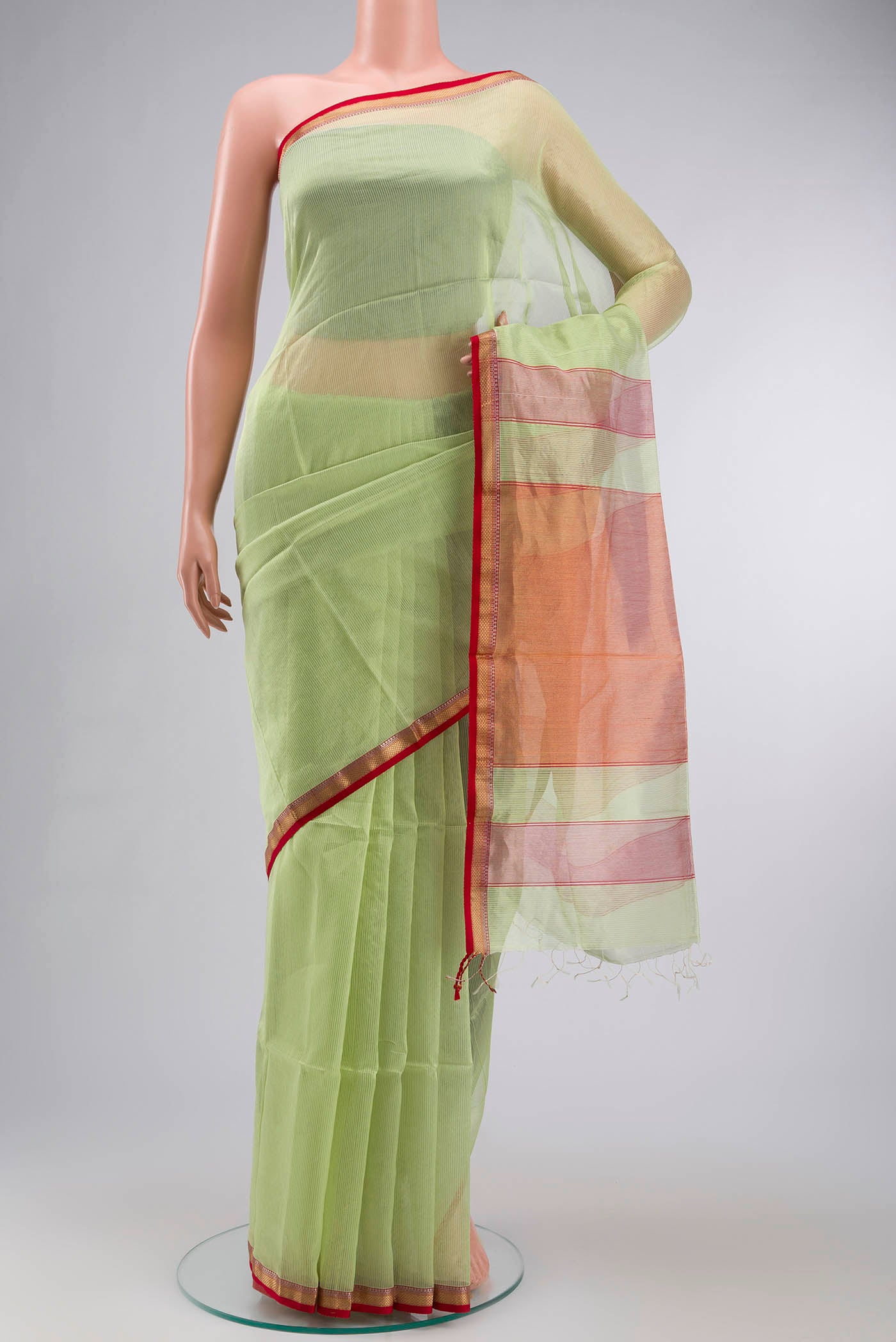 Green Maheshwari Silk Cotton Saree with Stripes on the body and Zari Border displayed on a mannequin