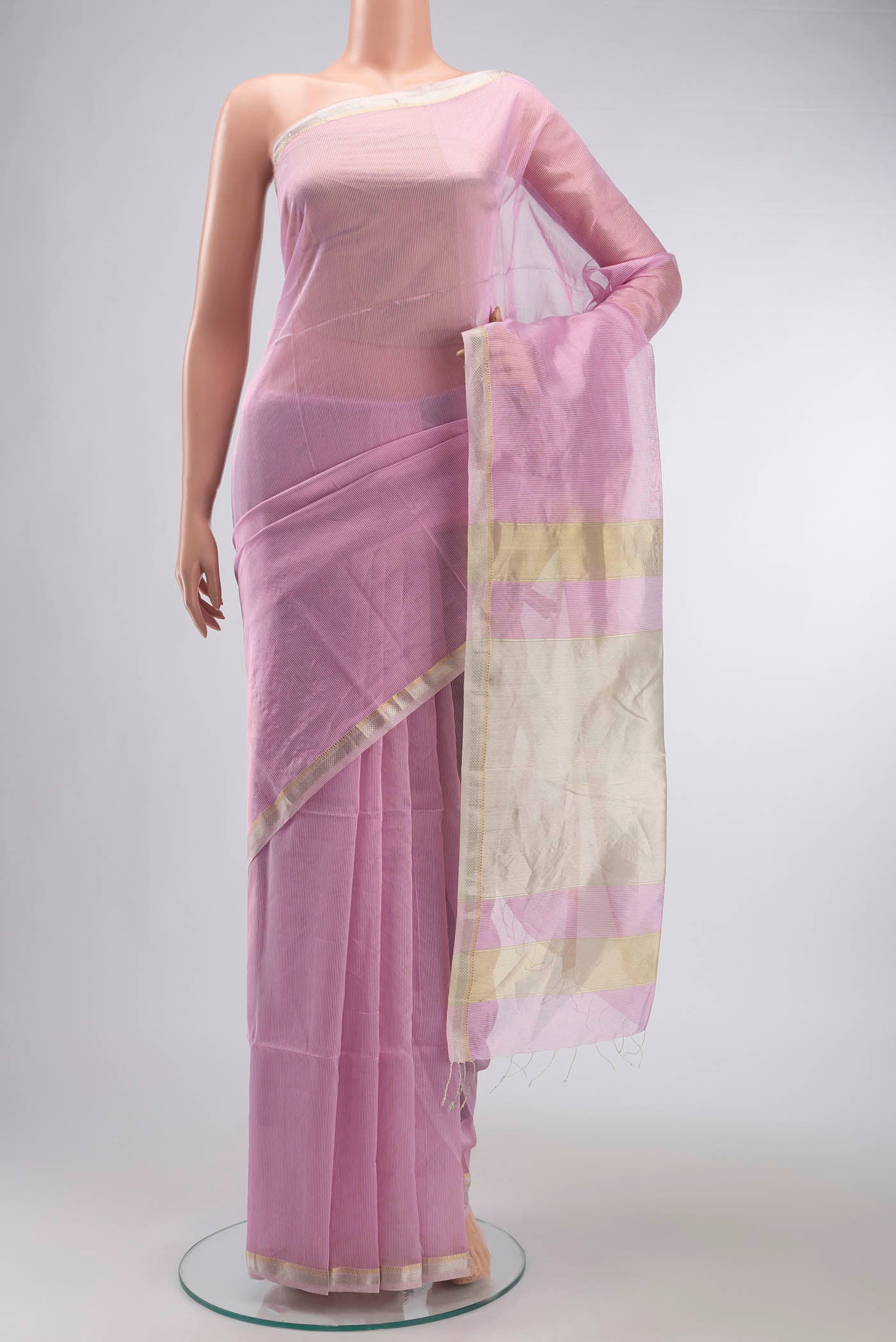 Pink Maheshwari Silk Cotton Saree with Stripes on the body and Zari Border displayed on a mannequin