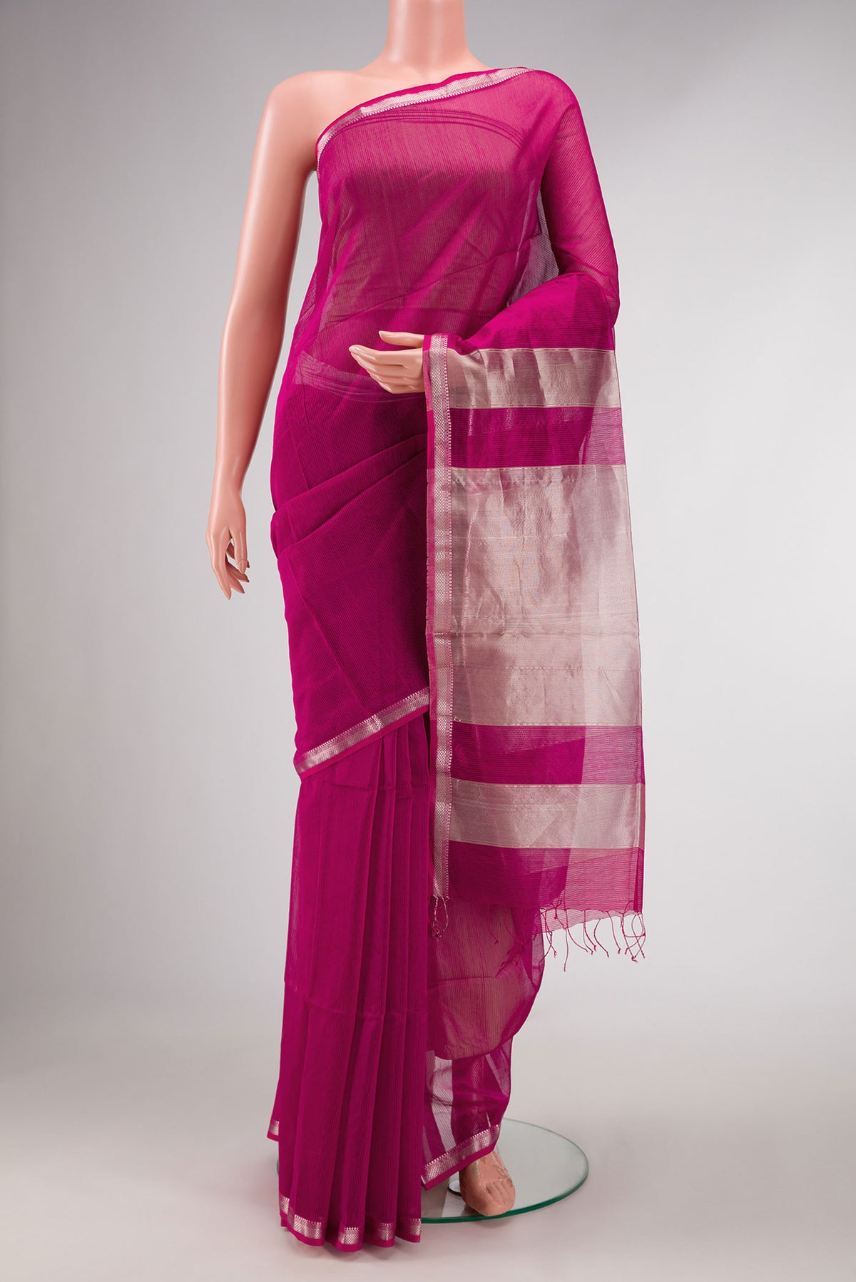 Pink Dual Tone Silk Cotton Saree with Stripes on the body and Zari Border displayed on a mannequin