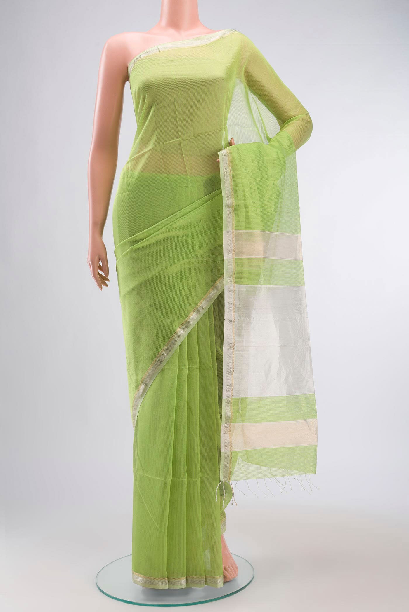 Green Maheshwari Silk Cotton Saree with Stripes on the body and Zari Border displayed on a mannequin