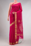 Pink Dual Tone Maheshwari Silk Saree with Stripes on the body and Zari Border displayed on a mannequin