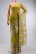 Green Maheshwari Silk Saree with Stripes on the body and Zari Border displayed on a mannequin