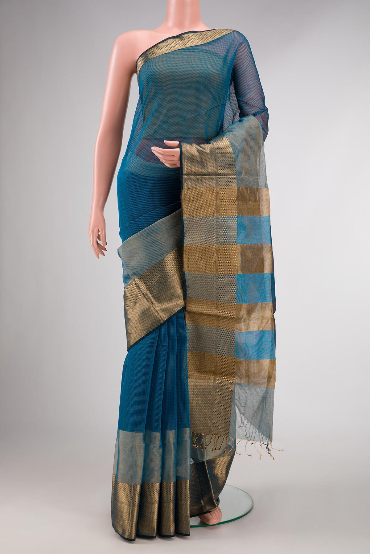 Maya Blue Dual Tone Silk Cotton Saree with Stripes on the body and Zari Border displayed on a mannequin