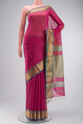 Pink Maheshwari Silk Cotton Saree with Checked design on the body and Zari Border displayed on a mannequin