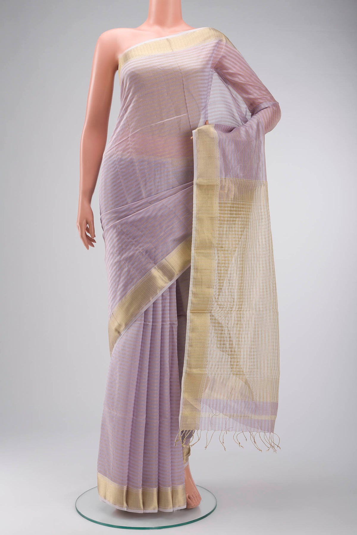 Lavender Maheshwari Silk Cotton Saree with Stripes on the body and Zari Border displayed on a mannequin