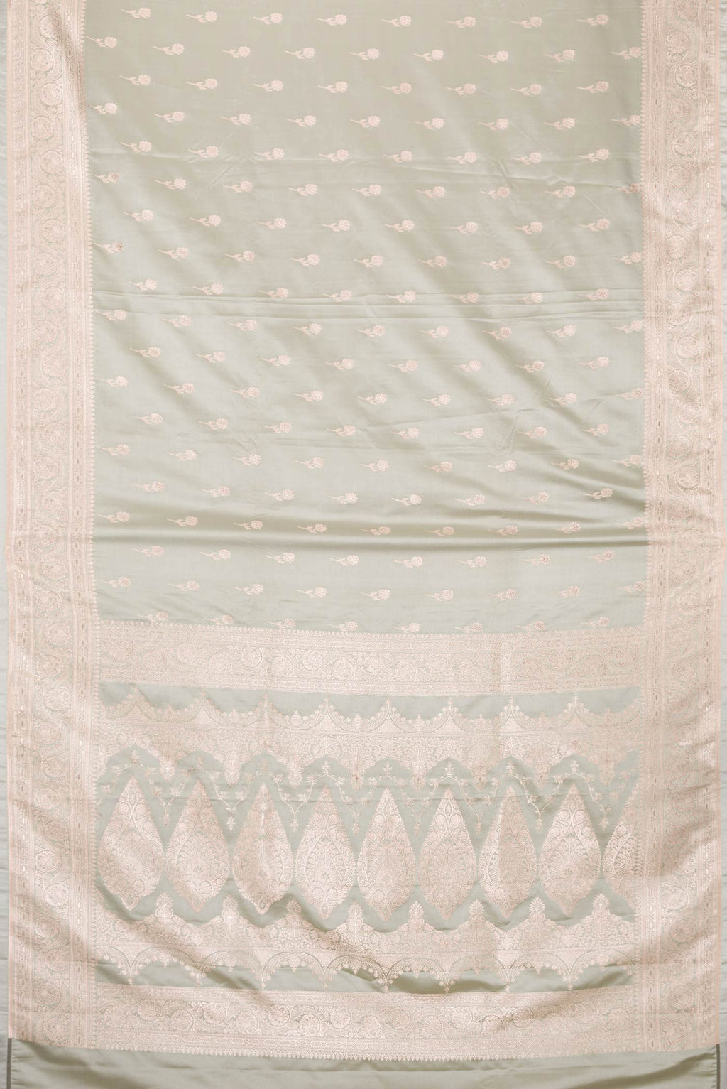 Flat view of Grey Dual Tone Blended Banarasi Silk Saree with Zari Butta on the body and Zari Border. 