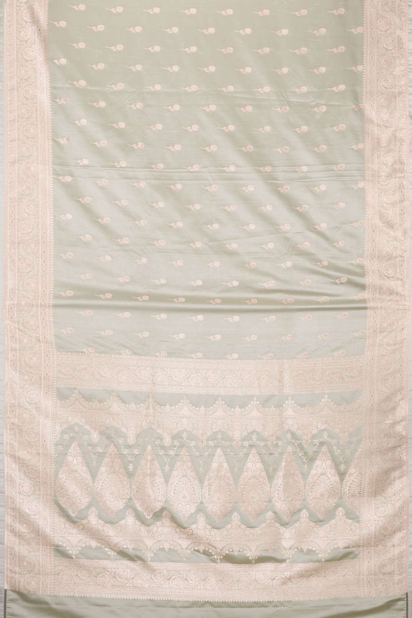 Flat view of Grey Dual Tone Blended Banarasi Silk Saree with Zari Butta on the body and Zari Border. 