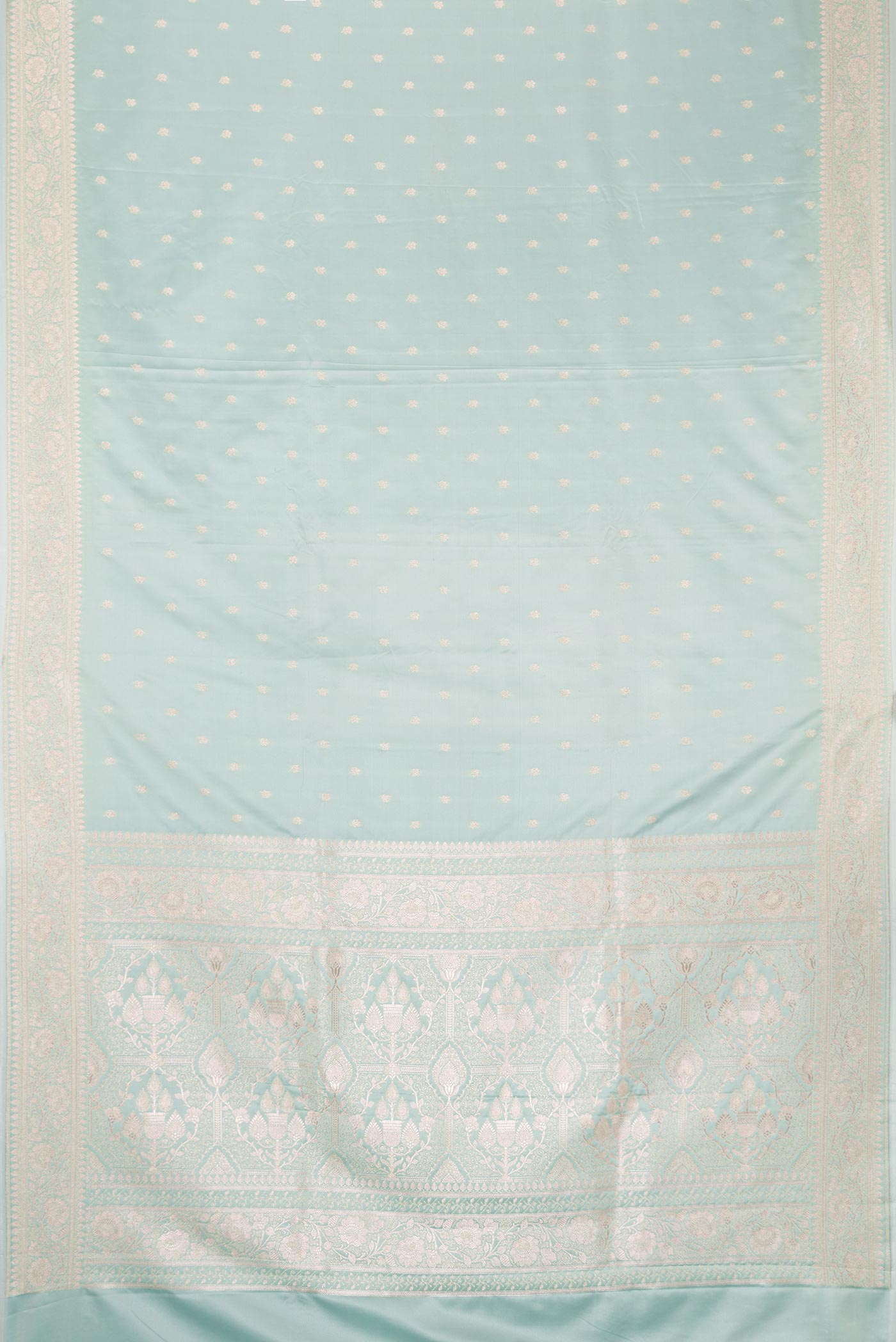 Flat view of Light Green Dual Tone Blended Banarasi Silk Saree with Zari Butta on the body and Zari Border. 