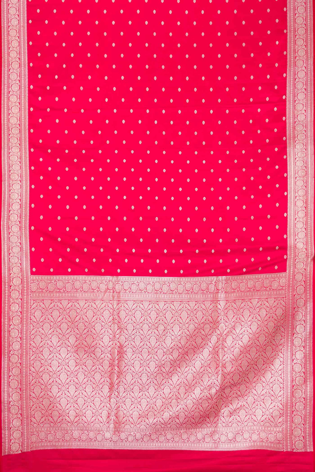 Flat view of Red Dual Tone Blended Banarasi Silk Saree with Zari Butta on the body and Zari Border. 