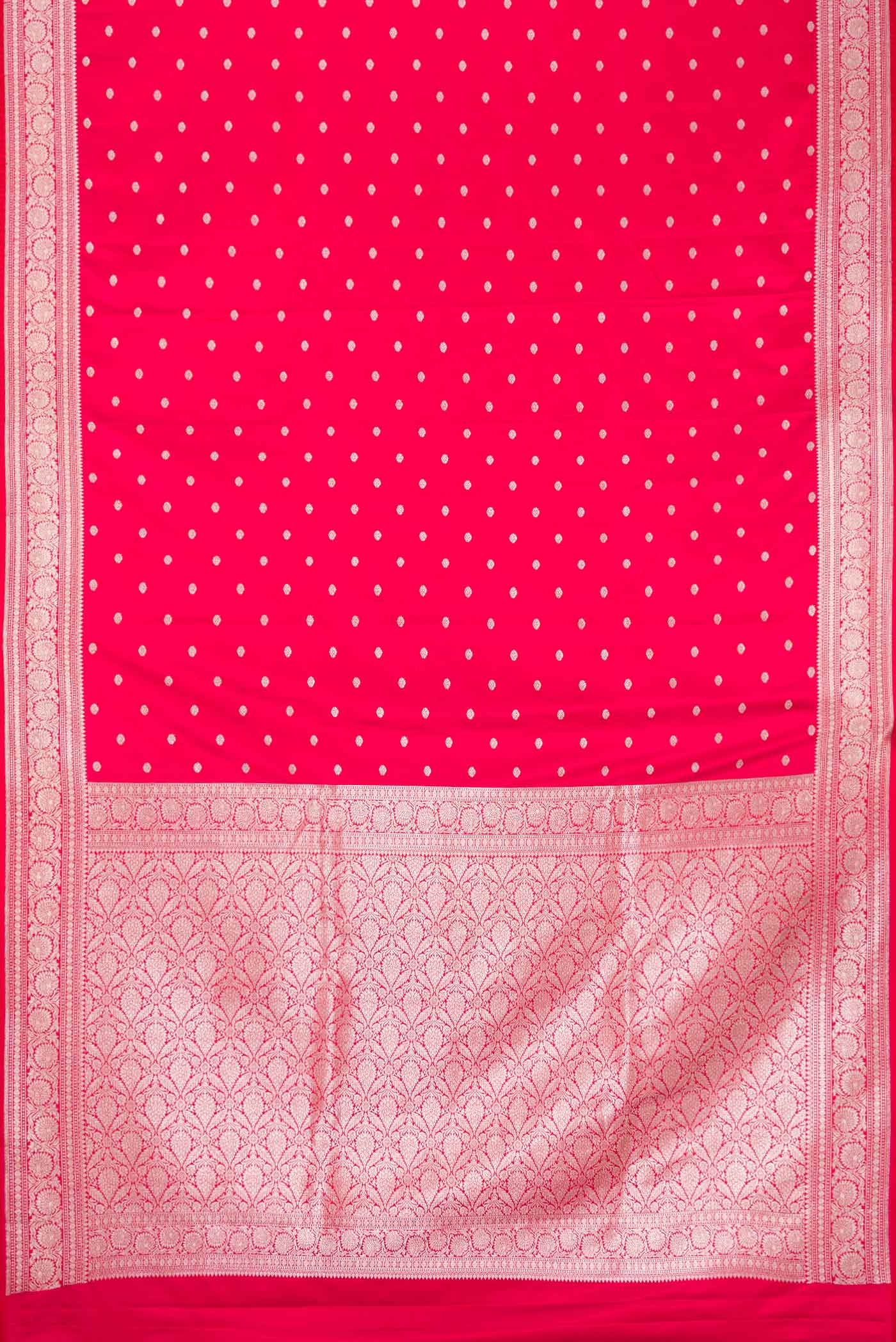 Flat view of Red Dual Tone Blended Banarasi Silk Saree with Zari Butta on the body and Zari Border. 