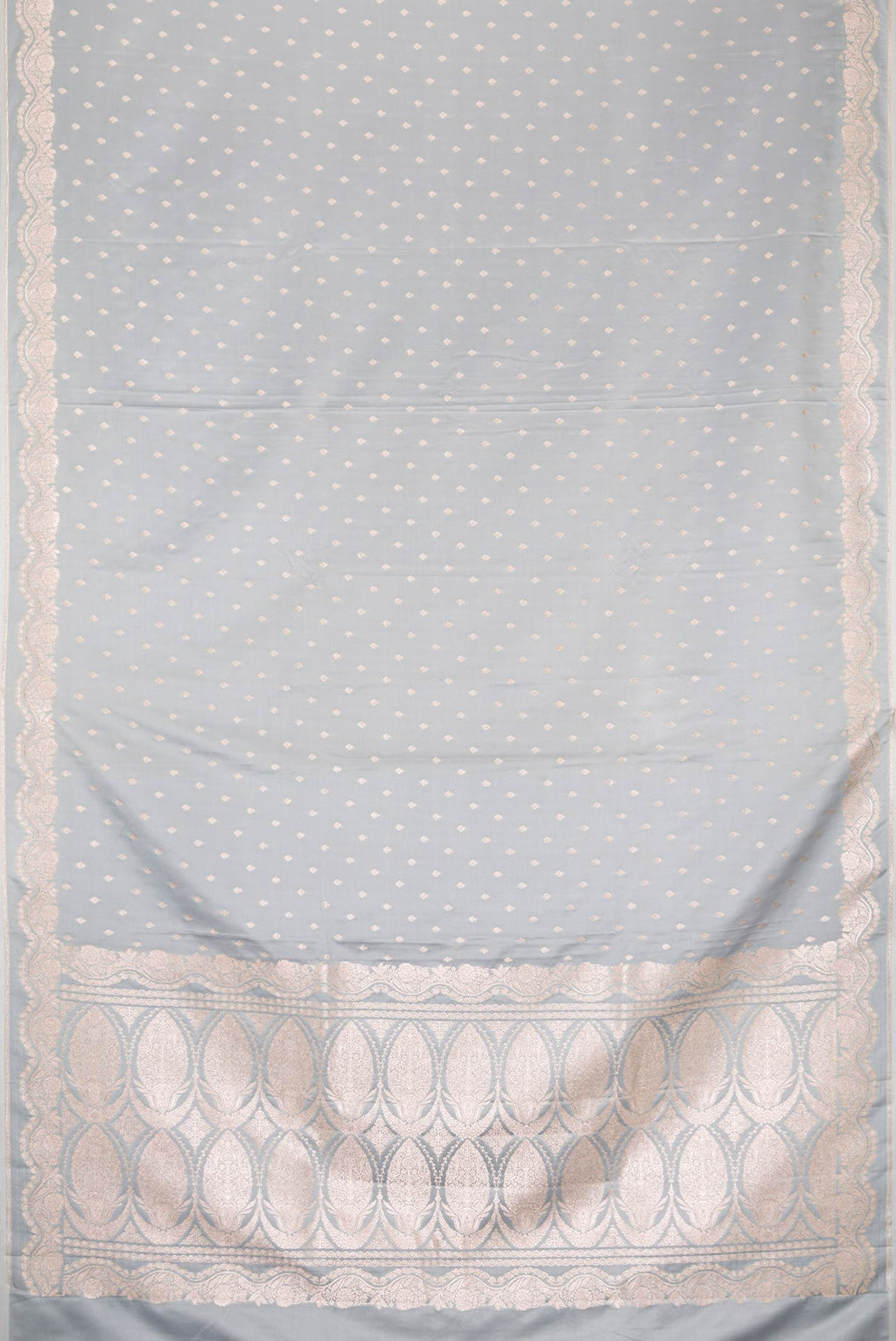 Flat view of Grey Dual Tone Blended Banarasi Silk Saree with Zari Butta on the body and Zari Border. 