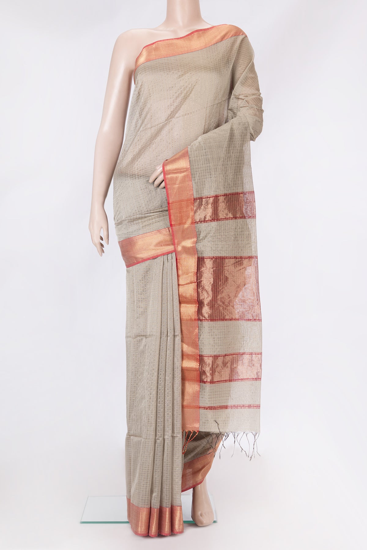 Grey Dual Tone Maheshwari Silk Cotton Saree with Checked design on the body and Zari Border.  displayed on a mannequin