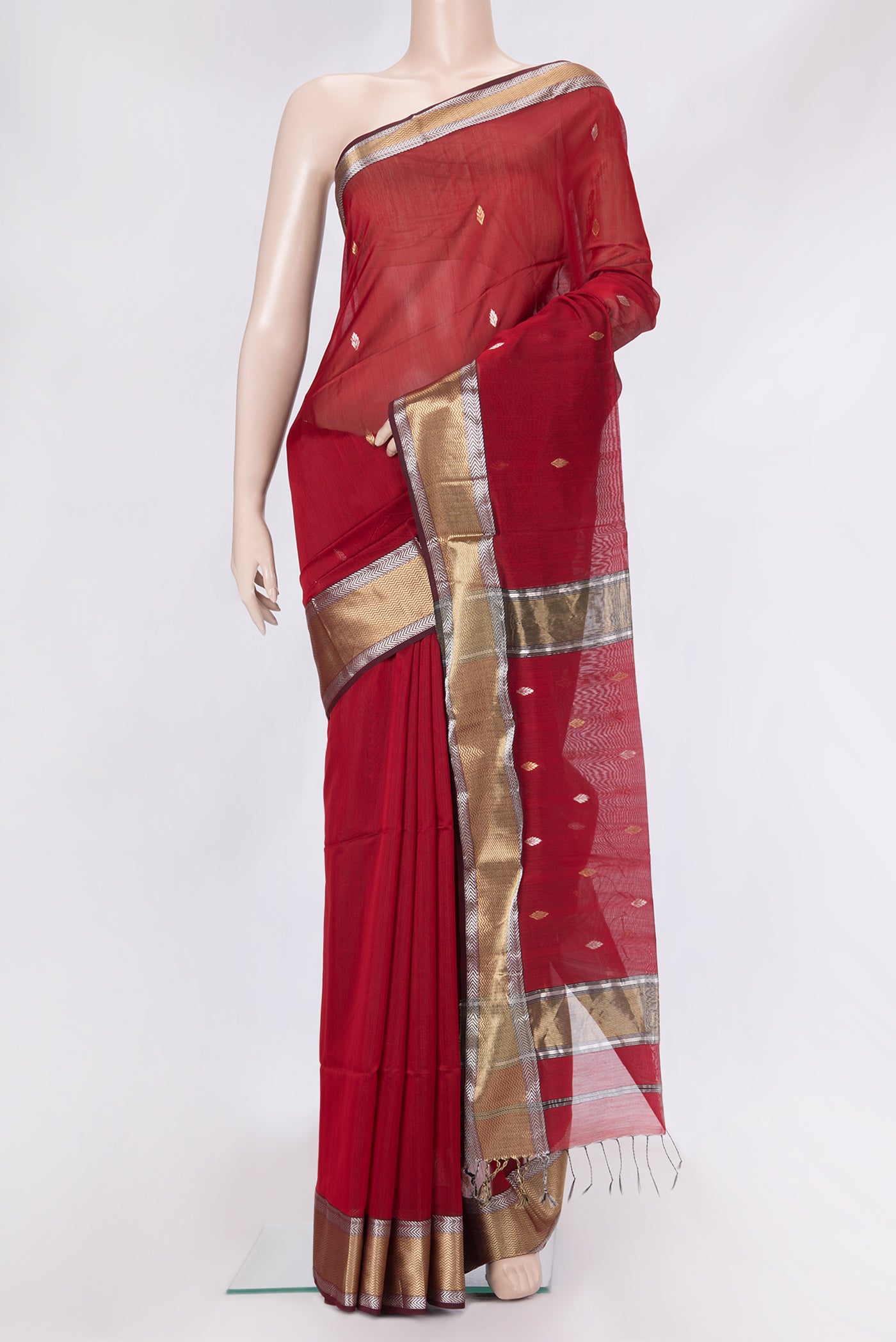 Maroon Dual Tone Maheshwari Silk Saree with Zari Butta on the body and Zari Border.  displayed on a mannequin