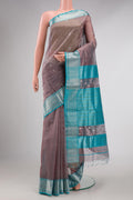 Grey Dual Tone Kota Silk Saree with Zari Butta on the body and Zari Border displayed on a mannequin