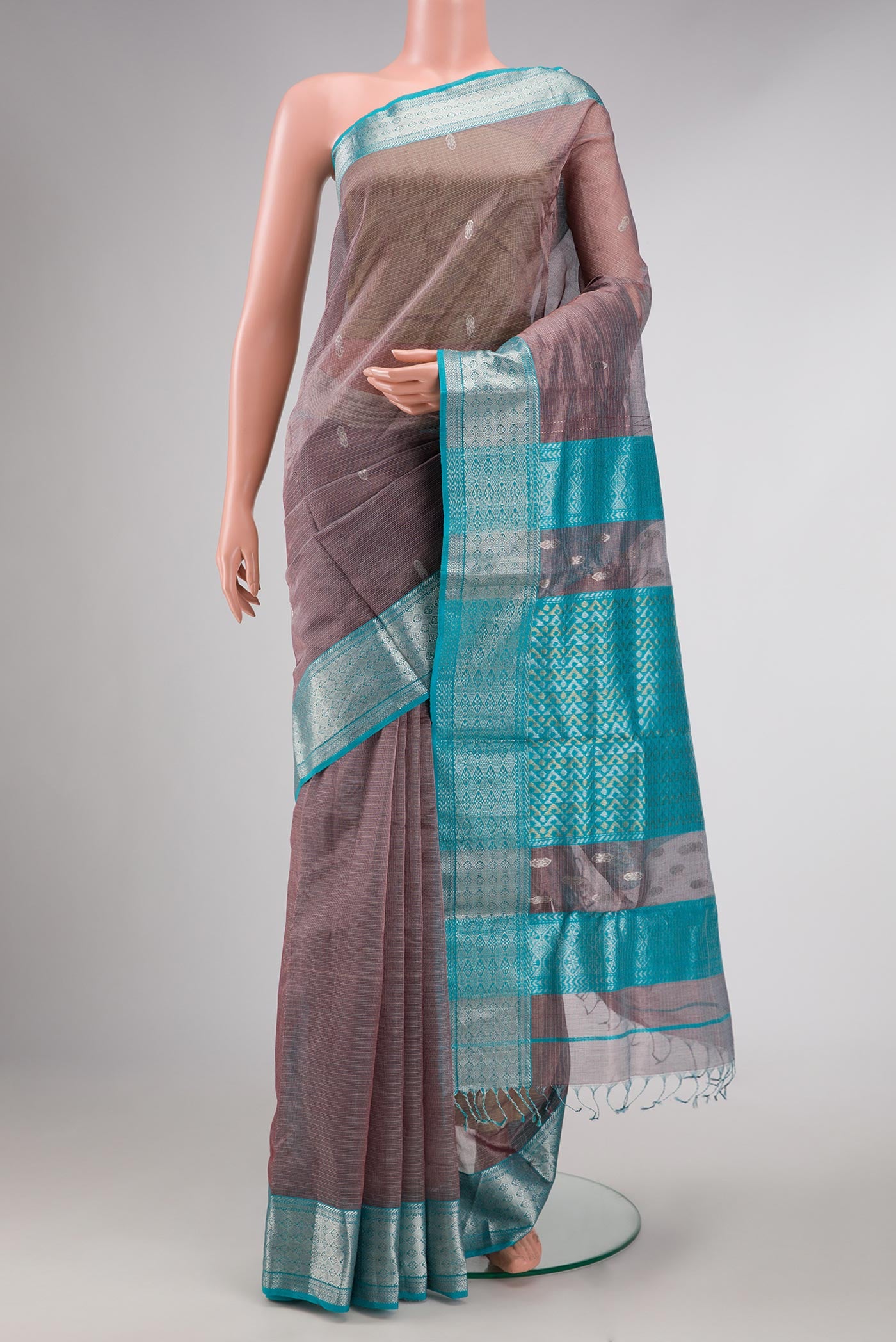 Grey Dual Tone Kota Silk Saree with Zari Butta on the body and Zari Border displayed on a mannequin
