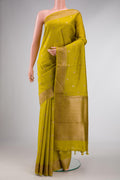 Mehandi Green Dual Tone Tussar Silk Saree with Checked design on the body and Zari Border displayed on a mannequin