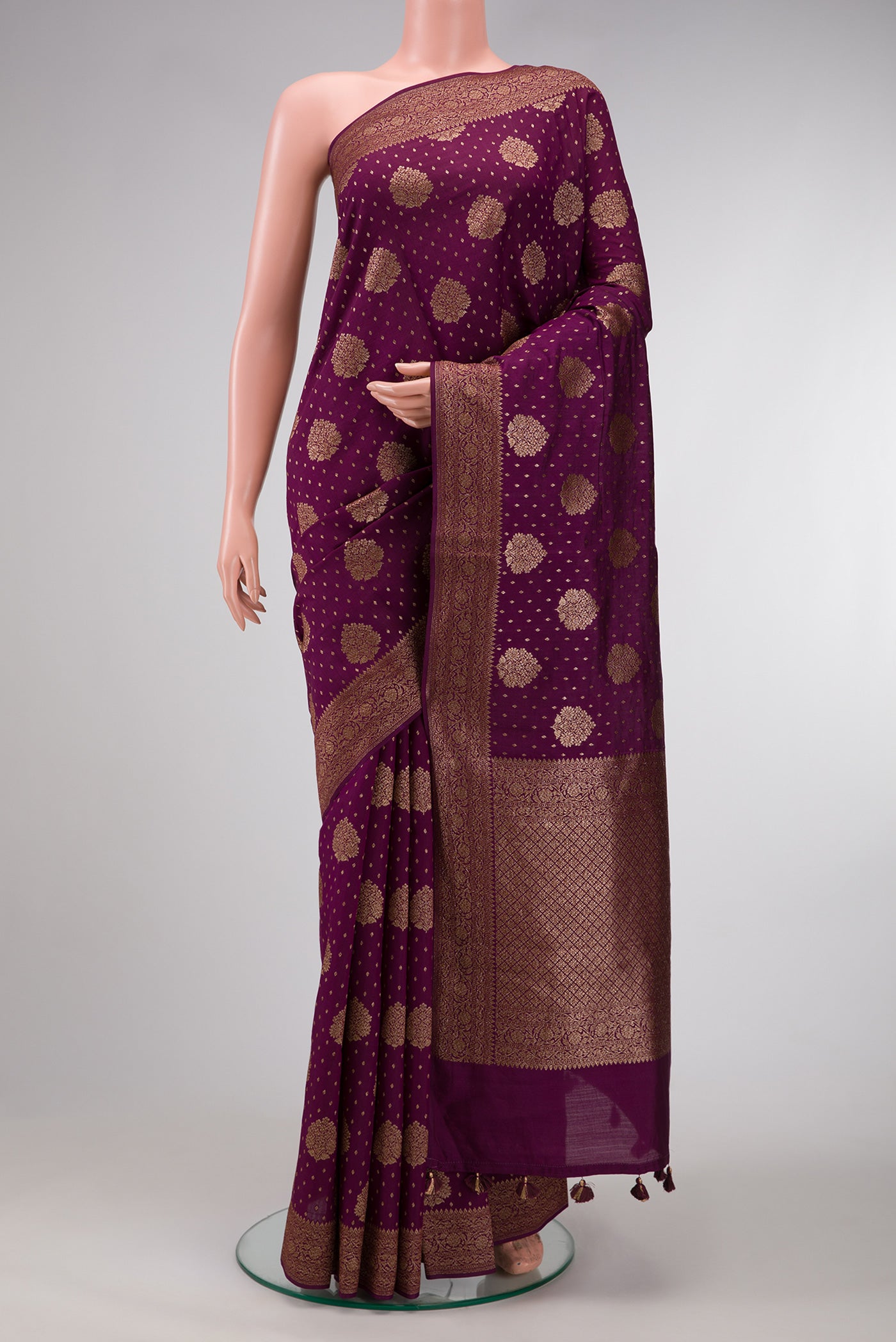 Burgundy Dual Tone Tussar Silk Saree with Zari Brocade on the body and Zari Border.  displayed on a mannequin