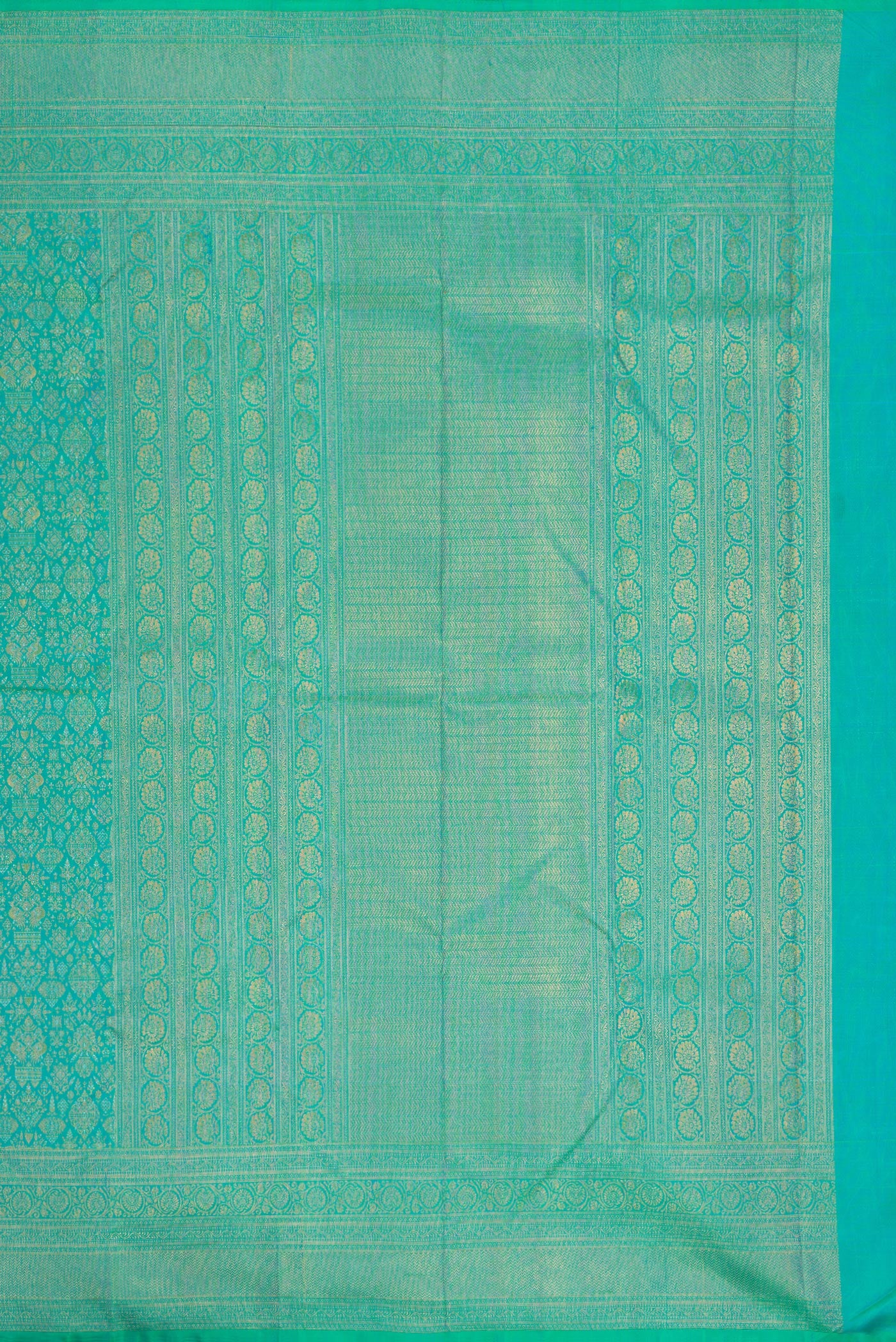 Close up image of the pallu of Sea Green Dual Tone Kanchipuram Silk Saree with Zari Brocade on the body and Fancy Border. 