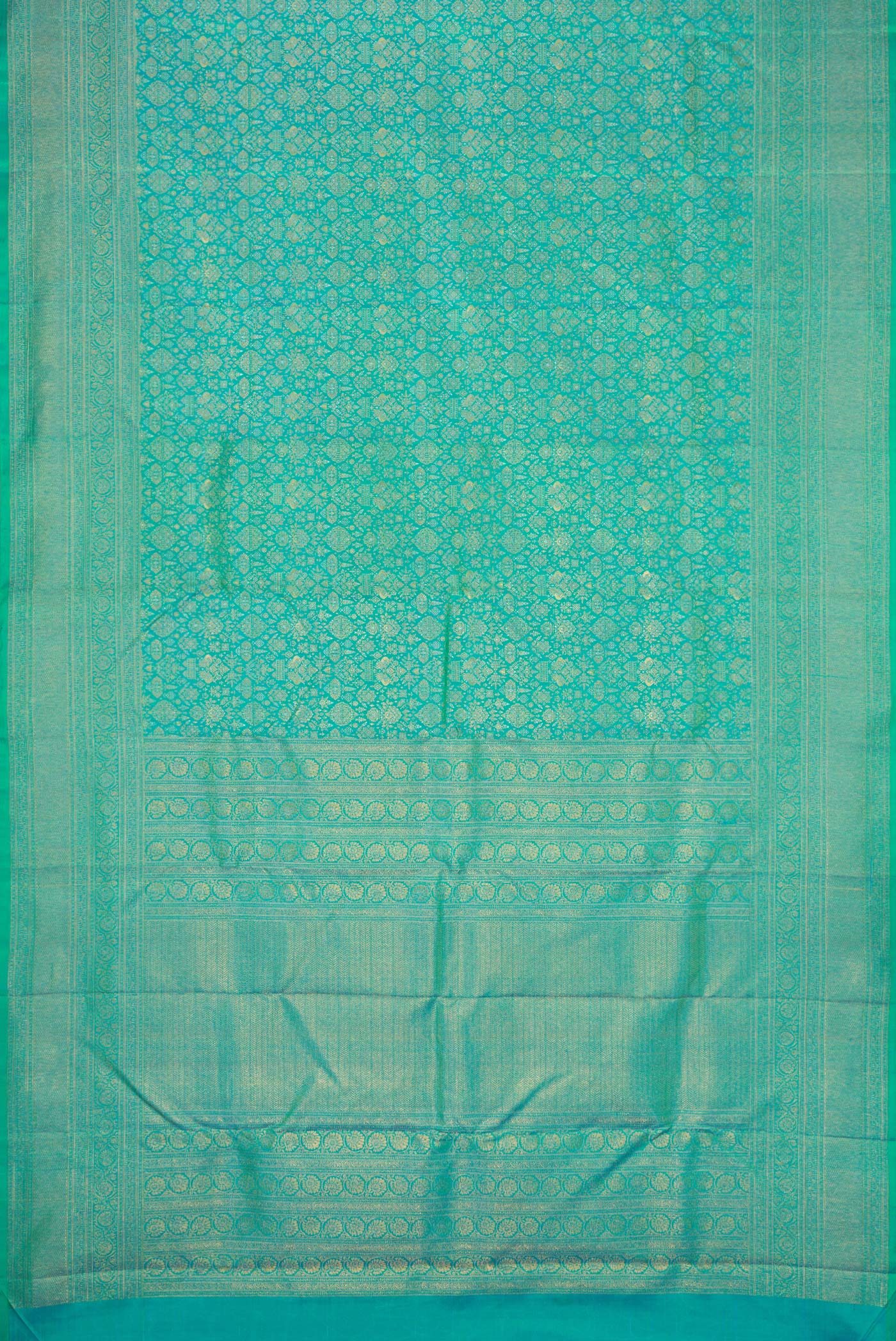 Flat view of Sea Green Dual Tone Kanchipuram Silk Saree with Zari Brocade on the body and Fancy Border. 