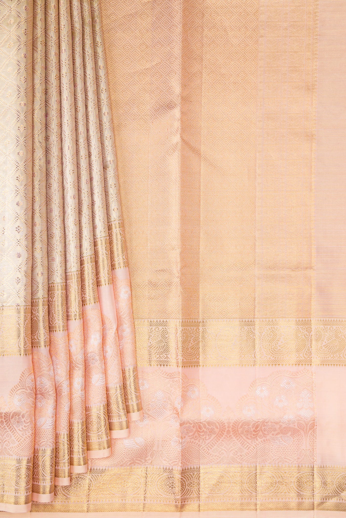 Pleats and pallu of Gold Dual Tone Kanjivaram Tissue Silk Saree with Zari Brocade on the body and Fancy Border. 