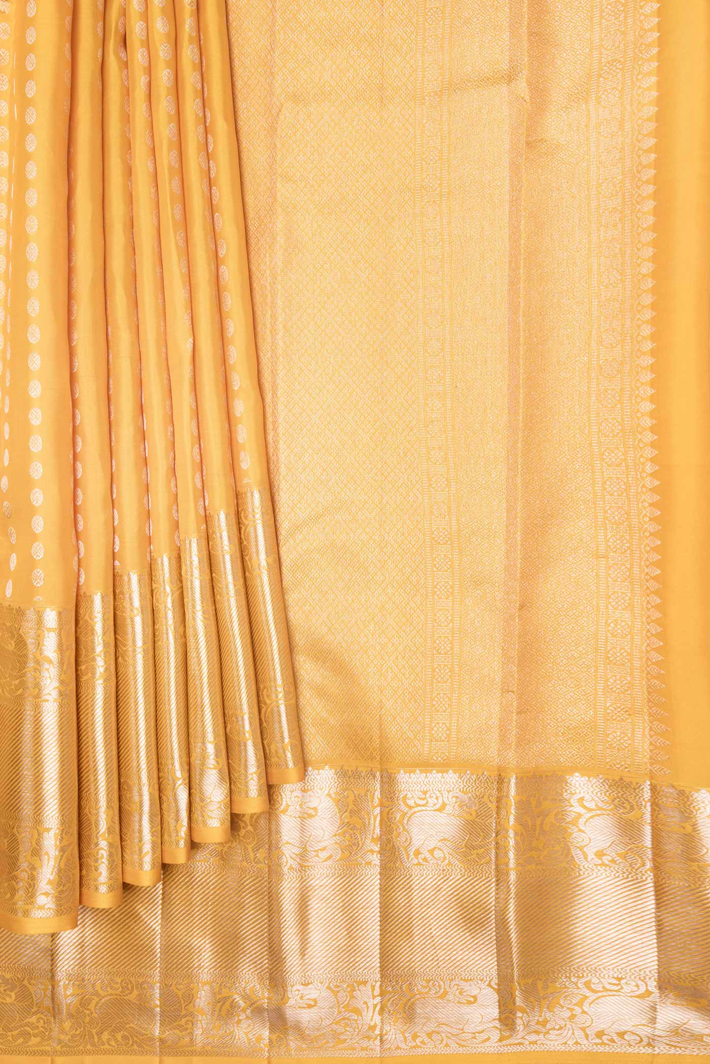 Pleats and pallu of Yellow Dual Tone Kanchipuram Saree with Zari Brocade on the body and Zari Border