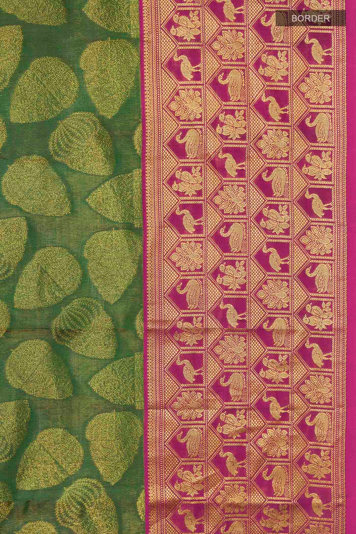 Border image of Green Kanchipuram Silk Saree with Zari Butta on the body and Zari Border
