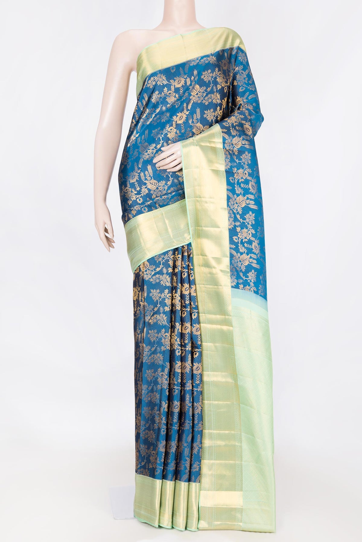 Peacock Blue Dual Tone Kanchipuram Saree with Zari Brocade on the body and Zari Border displayed on a mannequin