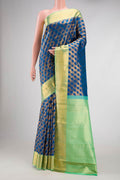 Peacock Blue Dual Tone Kanchipuram Silk Saree with Zari Brocade on the body and Zari Border.  displayed on a mannequin