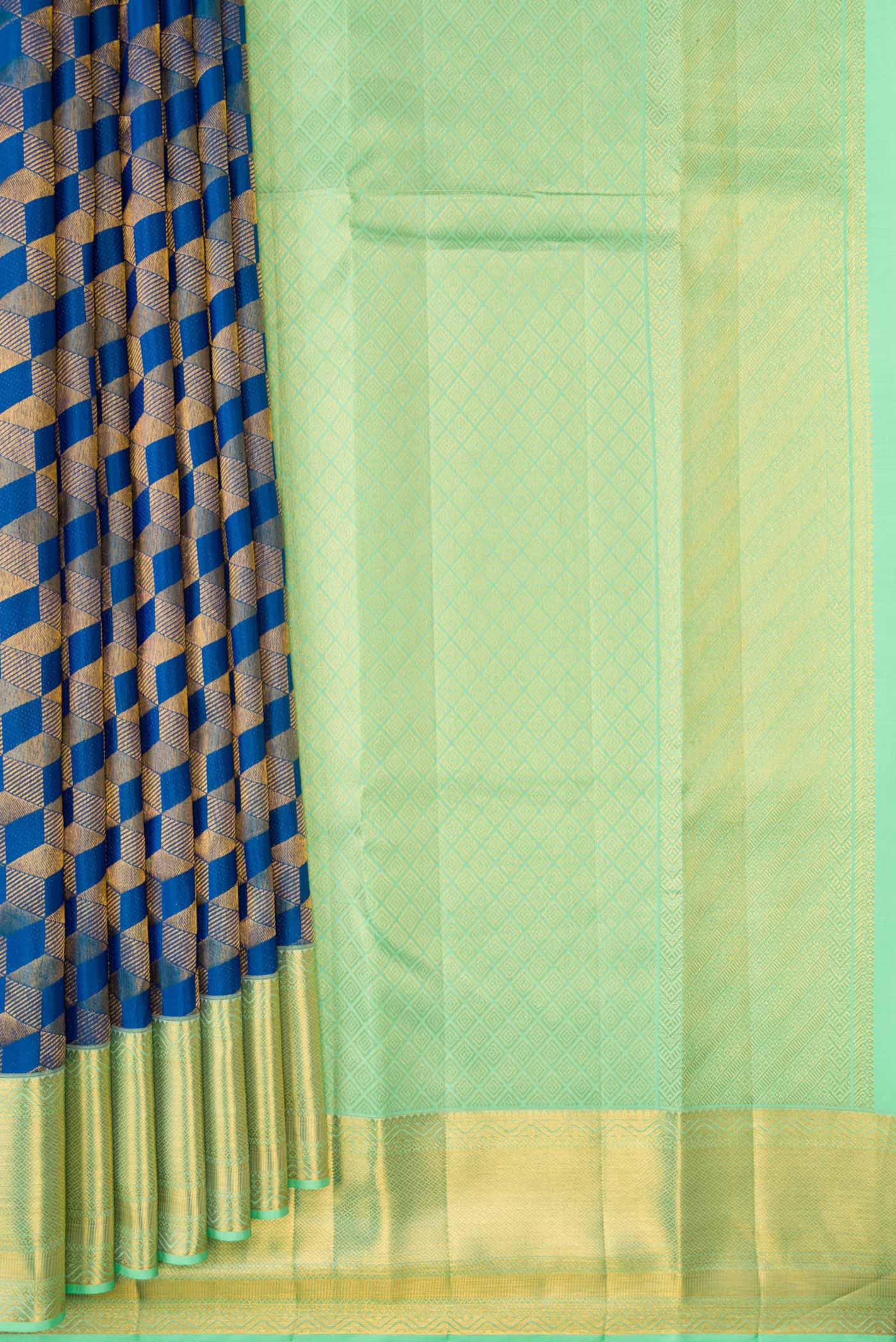 Pleats and pallu of Peacock Blue Dual Tone Kanchipuram Silk Saree with Zari Brocade on the body and Zari Border. 