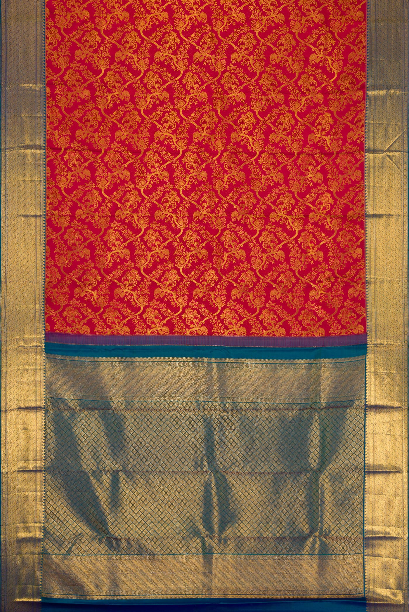 Flat view of Maroon Dual Tone Kanchipuram Silk Saree with Zari Brocade on the body and Zari Border. 