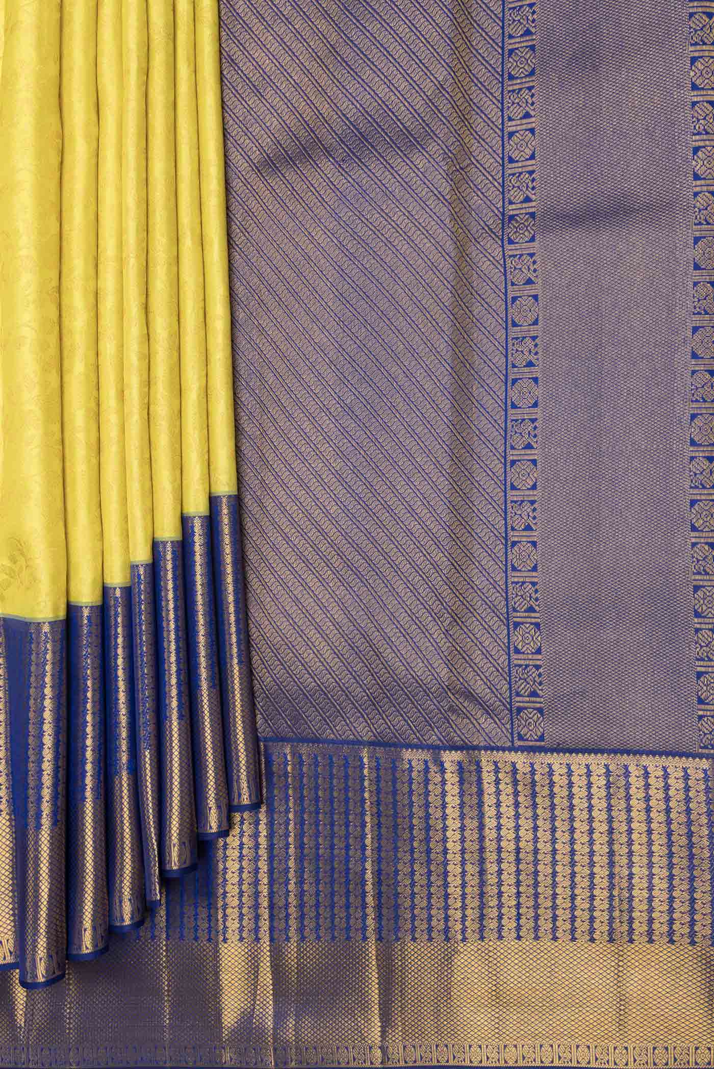 Pleats and pallu of Lemon Yellow Dual Tone Kanchipuram Saree with Zari Brocade on the body and Zari Border