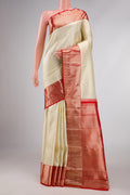 Off White Dual Tone Kanchipuram Silk Saree with Zari Brocade on the body and Zari Border displayed on a mannequin