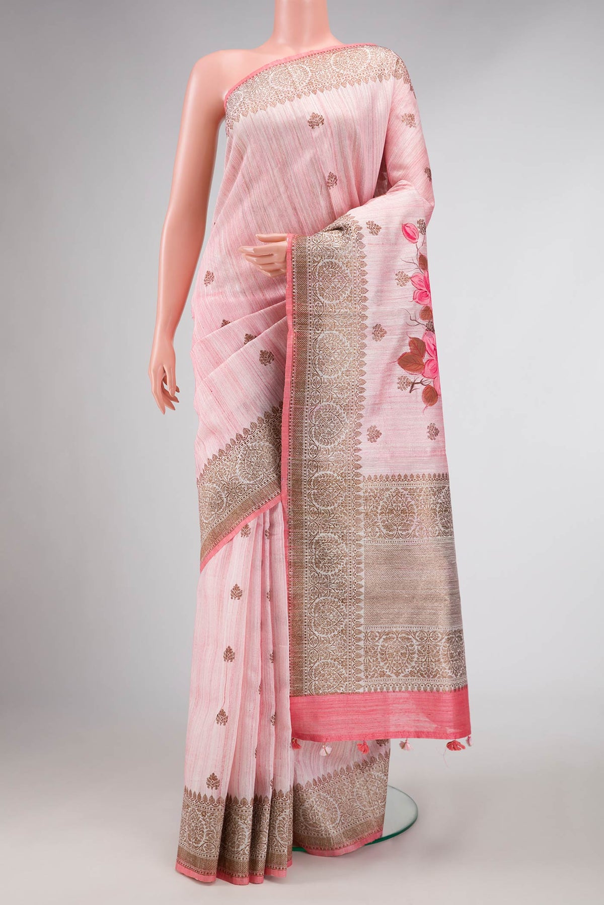 Pink Dual Tone Raw Silk Saree with Zari Butta on the body and Zari Border displayed on a mannequin