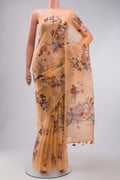 Peach Organza Silk Saree with Printed design on the body and Without Border displayed on a mannequin