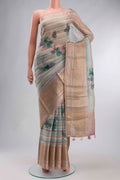 Blue Organza Silk Saree with Stripes on the body and Zari Border displayed on a mannequin