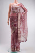 Mauve Organza Silk Saree with Floral Print on the body and Zari Border displayed on a mannequin