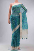 Multi Color Organza Silk Saree with Printed design on the body and Zari Border displayed on a mannequin