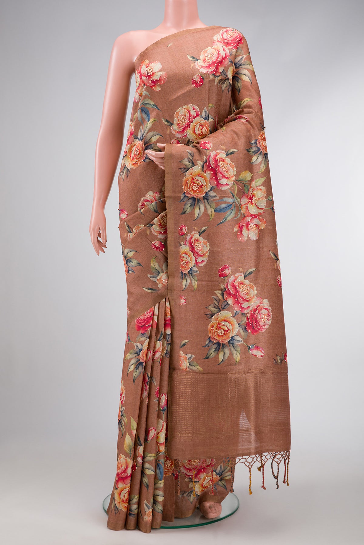 Brown Dual Tone Tussar Silk Saree with Printed design on the body and Thin Zari Line.  displayed on a mannequin