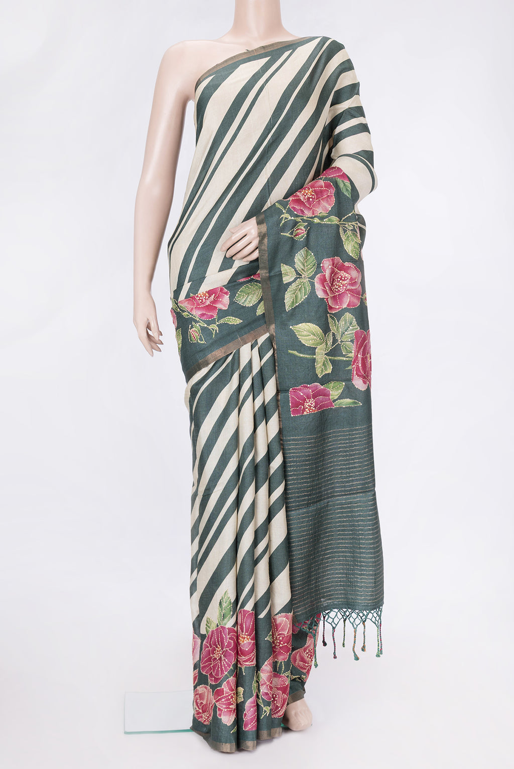Green Dual Tone Tussar Silk Saree with Embroidery on the body and Embroidery Border.  displayed on a mannequin