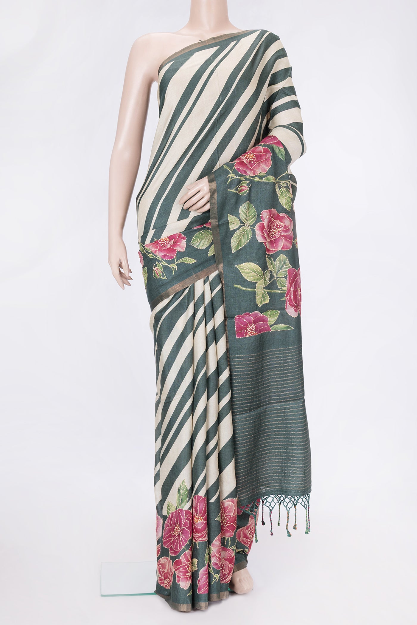 Green Dual Tone Tussar Silk Saree with Embroidery on the body and Embroidery Border.  displayed on a mannequin