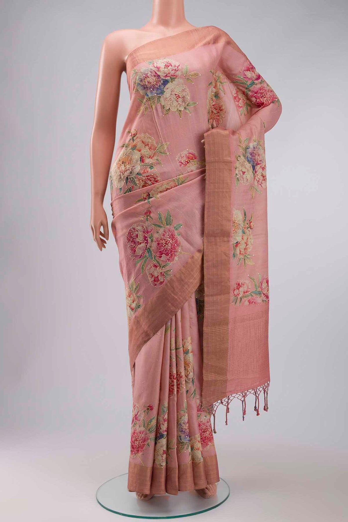 Rose pink Bhagalpuri Tussar Silk Saree with Embroidery on the body and Zari Border displayed on a mannequin