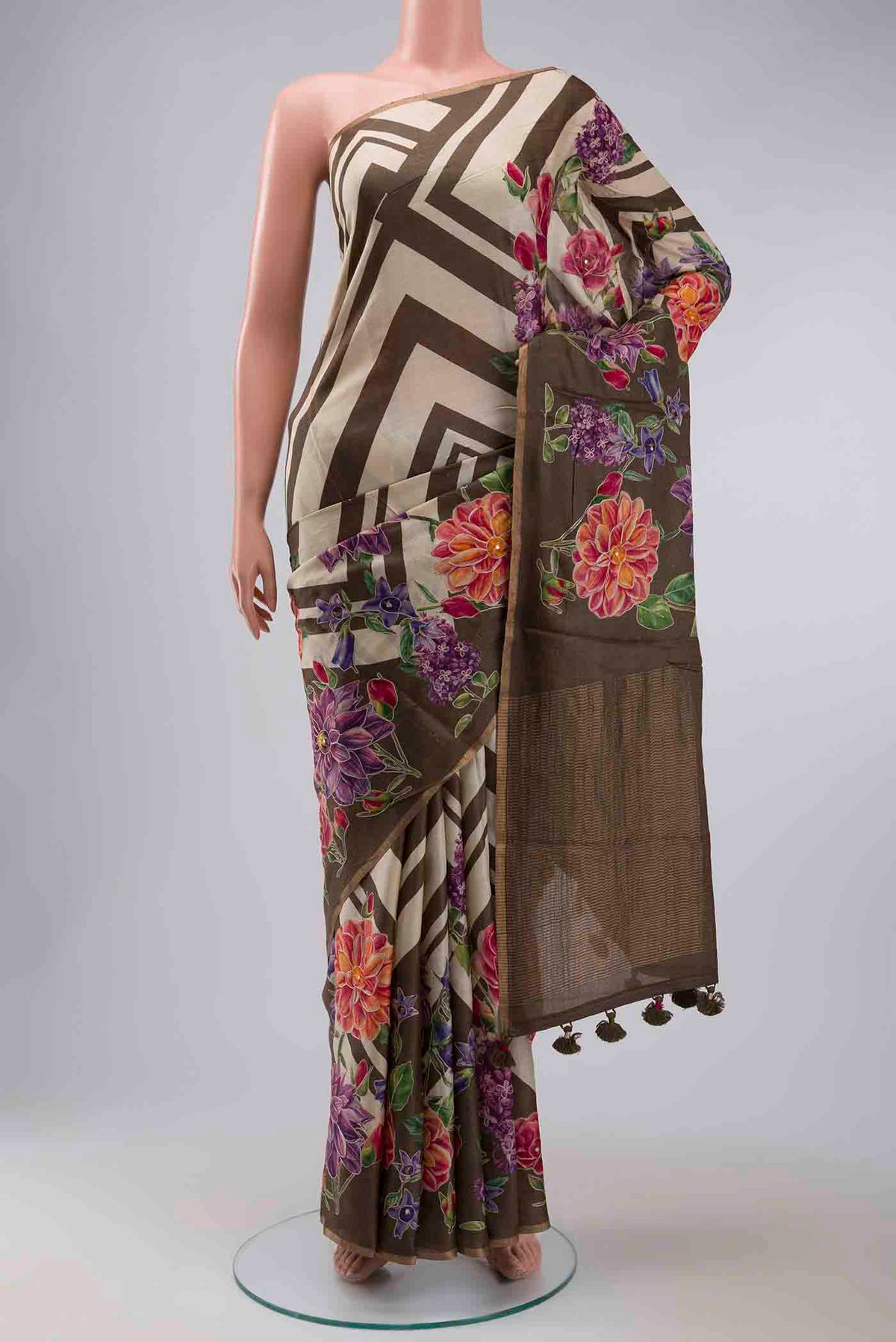 Brown Bhagalpuri Tussar Silk Saree with Embroidery on the body and Zari Border displayed on a mannequin