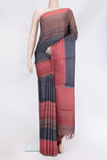 Navy Blue Dual Tone Tussar Silk Saree with Printed design on the body and Embroidery Border.  displayed on a mannequin