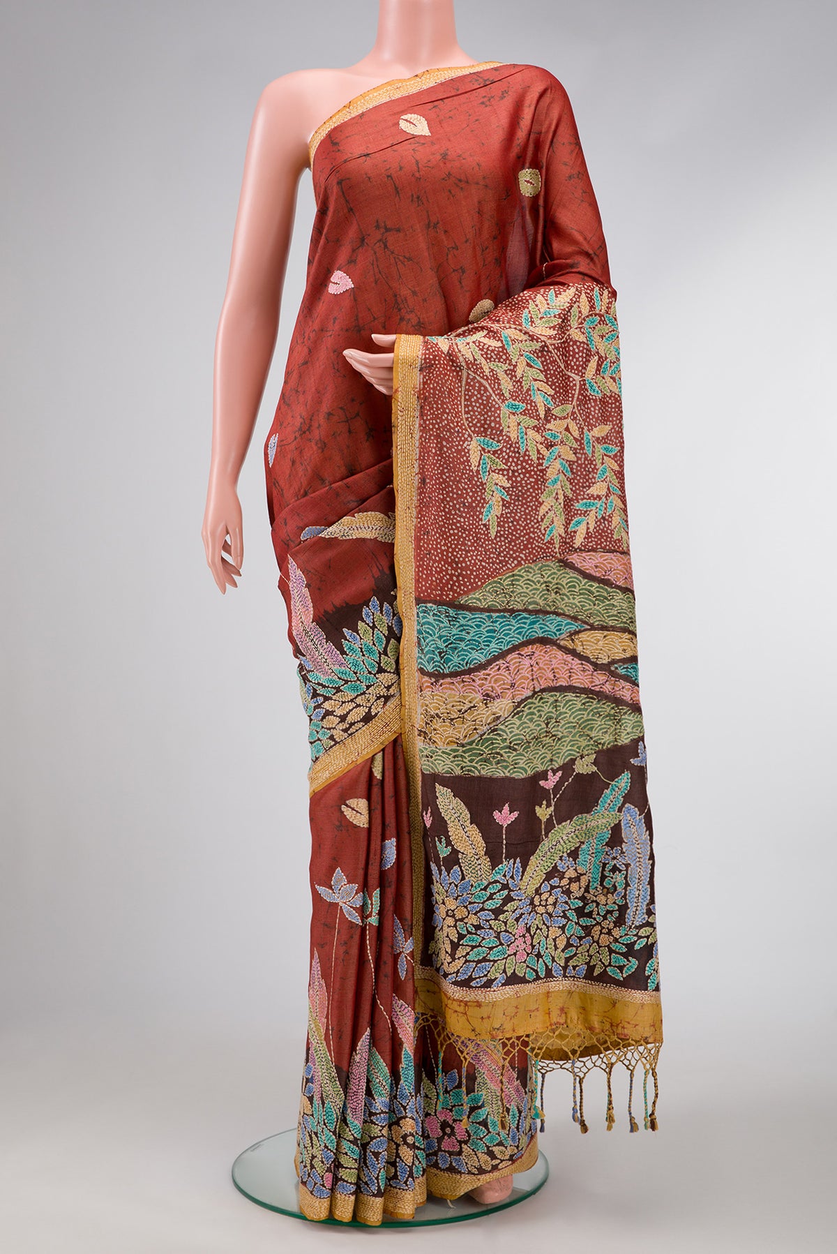 Brown Dual Tone Tussar Silk Saree with Embroidery on the body and Embroidery Border.  displayed on a mannequin